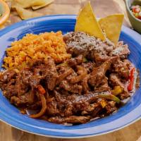 Bistek Ranchero · Steak cooked with Onions, Tomatoes, Bell Peppers, Jalapeño and Ranchero Salsa.
Served with R...