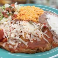 Chile Relleno · Chile Pasilla Pepper-stuffed with Cheese and drizzled with Mild Red Sauce. 
Served with Rice...