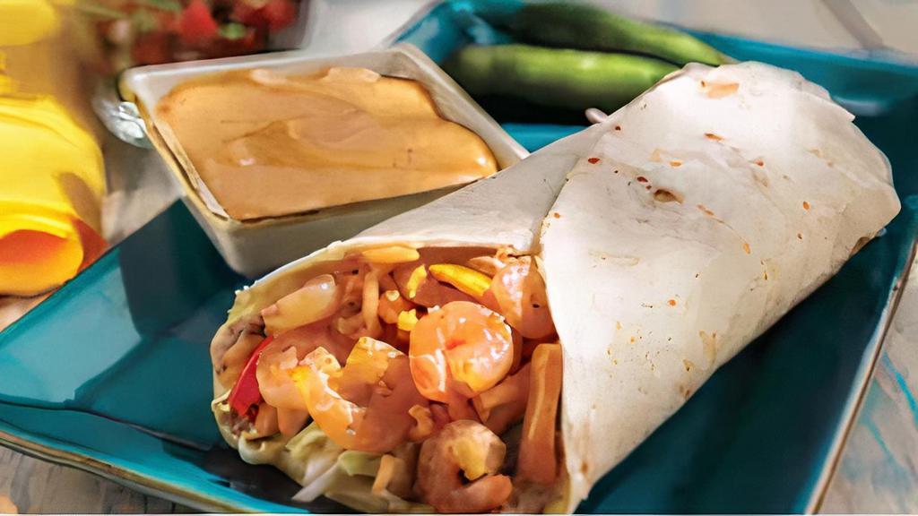 Burrito Del Mar · Shrimp or fish, Grilled Onions and Bell Peppers, Cabbage, Rice, Beans, Pico de Gallo, 
Cheese & Chipotle Sauce