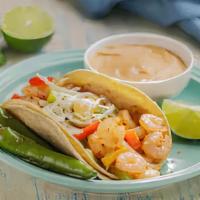 Taco Del Mar · Shrimp or Fish, Grilled Onions, Bell Peppers, Cabbage, Pico de Gallo
& Chipotle Sauce