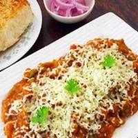 Cheese Pav Bhaji · Popular Indian street food where breakfast buns are served with spicy mashed veggies topped ...