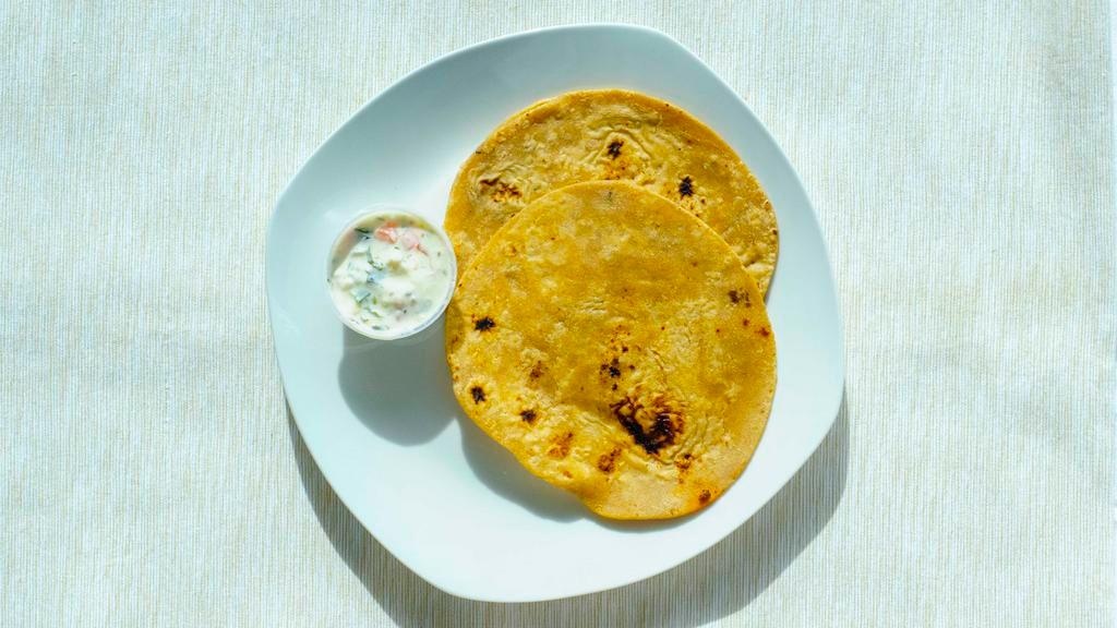 Chapati (1 piece ) · A thin unleavened whole-grain bread cooked on a griddle.