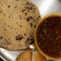  Kolhapuri Veg Rice Plate · Kolhapuri veg curry + plain rice + chapati or paratha+koshimbir ( raita) + papad .