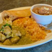 Chile Verde · Slow roasted pork tossed in our spicy and savory green sauce, served with rice and charro be...