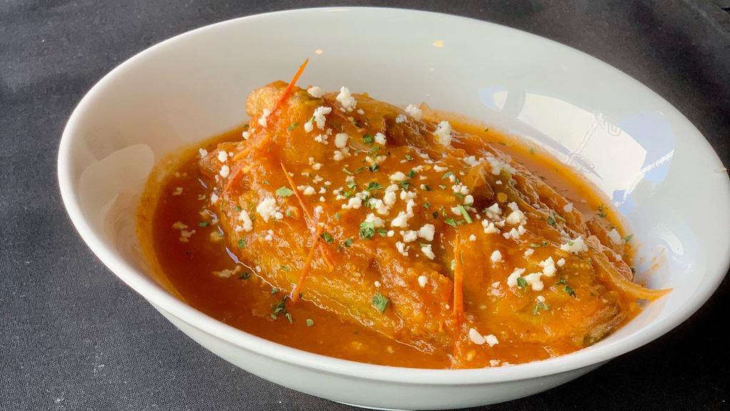 Chile Relleno · Tomatoes and jalapenos add immense flavor to our peppers stuffed with a blend of cheeses.