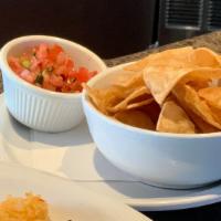 Chips & Salsa · House made corn tortilla chips with scratch made salsa