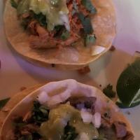  Tipsy Taco · One fried tortilla in between a soft one with melted cheese, choice of meat, onion, cilantro...
