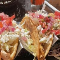 Crispy Tacos(3) · Choice of meat, lettuce, queso, pico, side of sour cream.