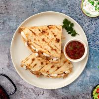 The Quesadilla Action · Cheese quesadilla served with a side of sour cream, pico de gallo and hot or mild salsa.