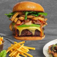 Last Fryday Night Burger · American beef patty topped with fries, avocado, caramelized onions, ketchup, lettuce, tomato...