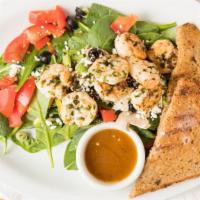Tiger Shrimp · spinach, tomato, cucumber, olives, green onion, feta cheese, grilled shrimp, Italian dressing.