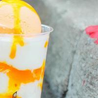 Scoop O' Mango · Milk icy layered with mango concentrates over custard pudding, & topped with mango ice cream.