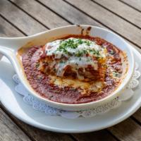 Lasagna al Forno · Baked lasagna with fennel seed sausage and meat sauce.