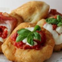 PIZZELLE · “le montanare”, 3 small neapolitan-style fried pizzas, tomato, mozzarella, oregano, Tuscan e...
