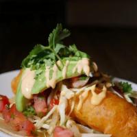 BAJA FISH TACOS Plate · two crispy battered cod, corn tortilla, cabbage, avocado, cilantro, with house-made sauce an...