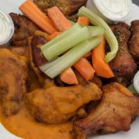 JP's Wings (6) · served with carrots and celery with choice of sauce for wings and choice of bleu cheese or r...