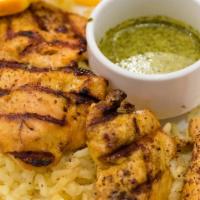 Chicken Shish Kabob · cubes of chicken breast marinated in special spices
skewered, flame-broiled served on a bed ...