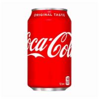 Coke · 12 oz. can.