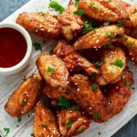 Spicy Chicken Wings · Spicy chicken wings cooked in a clay oven. Best wings ever!.
