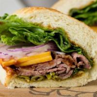 Slow Burn Sandwich · Tri-tip with spicy chipotle honey mustard, sport  peppers.