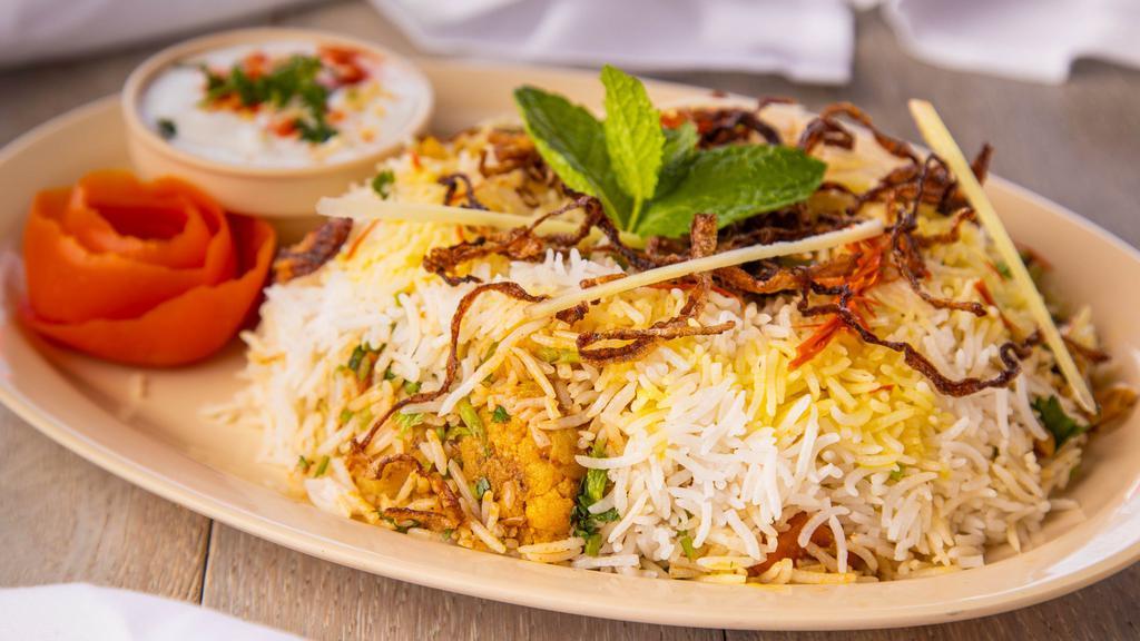 Veg Biryanis · Vegetable and rice cooked together along with Indian spices.