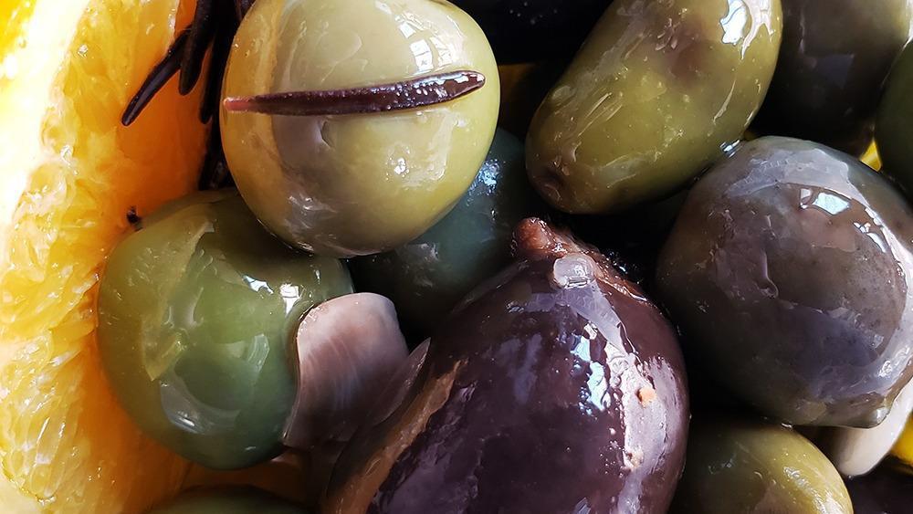 Amy's Olives  (16 oz) · Castelveltrano, Luques, Picholines With Oranges,Lemon, Rosemary, Garlic, Extra Virgin Olive Oil