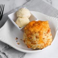 Cheddar Jalapeno Biscuit (V) by Homeroom · By Homeroom. A fluffy biscuit with hint of spice and covered in cheese, served with whipped ...