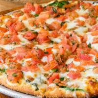 12' Medium Thin Italian Tomato · A thin crust pizza brushed with a fresh garlic, herb, and olive oil sauce, topped with diced...