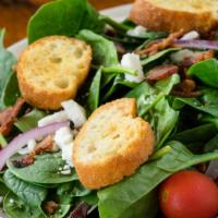 Spinach (Shared/Entree) · Baby spinach, feta cheese, croutons, red onion, and tomatoes (bacon optional).