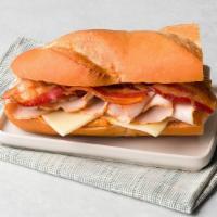 Smoked Turkey · Mesquite Smoked Turkey, bacon, jalapeno pepper jack cheese, chipotle gourmaise served on a F...