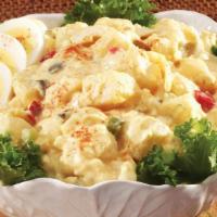 Deviled Egg Potato Salad · Our classic potato salad tossed with hard boiled eggs and sweet relish.