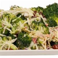 Broccoli Crunch Salad · Shredded broccoli, bacon bits, raisins, red onion, sunflower seeds, shredded carrots all tos...