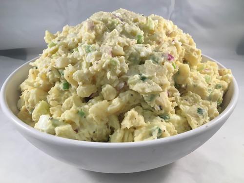 Potato Salad · Potatoes, chopped boiled eggs, onion, and red bell pepper tossed with a mayonnaise and vinegar dressing.