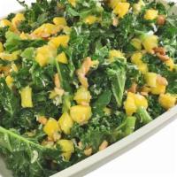 Kale Mango & Coconut Salad · Kale tossed with mango chunks, shredded coconut, and cashews all tossed in a light dressing.