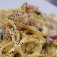 Spaghetti Carbonara · spagheti with egg yolk, parmesan, pancetta and a touch of cream