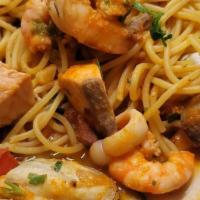 Linguine Pescatore · clams, mussels, calamari, shrimp and salmon in our delicious seafood sauce