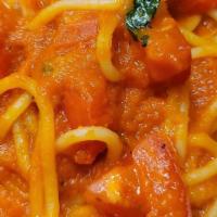 Spaghetti Pomodoro (Vegetarian) · Pasta with fresh basil, garlic, tomatoes, olive oil and marinara sauce