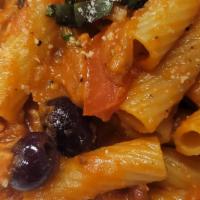 Rigatoni Amatriciana · Rigatoni pasta with pancetta, black olives and onions in a marinara sauce