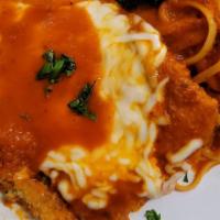 Pollo Parmigiana · Breaded chicken breast filet with marinara sauce and mozzarella cheese served over spaghetti