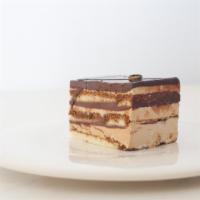 Chocolate Opera · Layer of vanilla sponge cake, coffee buttercream and chocolate ganache filling, topped with ...