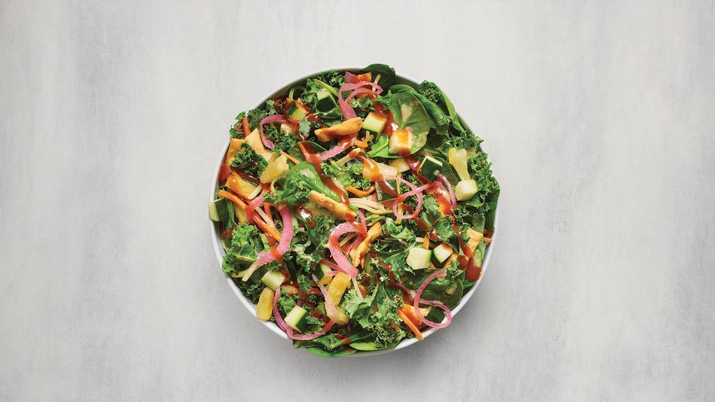 Zesty Asian Pineapple Salad - Flash Mod · Spinach, kale & broccoli power blend, Greek herb & tahini dressing, cucumber, pineapple, pickled red onions, honey soy-ginger glaze, crispy wonton strips