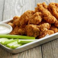 Boneless Wings · A full pound* of all-white-meat boneless wings | tossed in your choice of our signature sauc...