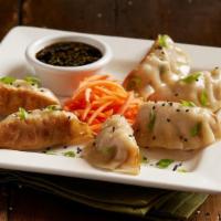 Chicken Pot Stickers · Pan-seared dumplings | chicken | ginger | garlic | yellow chives | green onions | soy ginger...