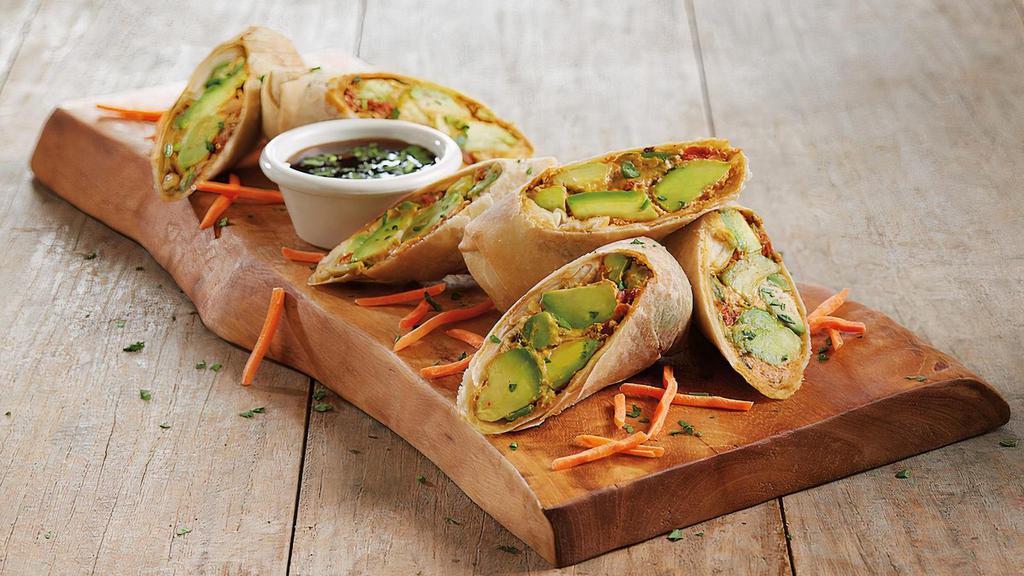 Avocado Egg Rolls · Avocado | cream cheese | sun-dried tomatoes | red onions | cilantro | chipotle peppers | sweet tamarind dipping sauce