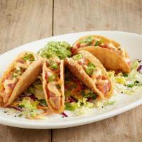 New Ahi Poke Tacos* · Crispy wonton taco shells | sashimi-grade ahi tuna | green onions | poke sauce | creamy srir...