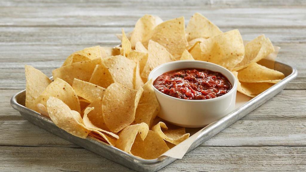 Chips And Fire-Roasted Salsa · Fire-roasted salsa | crispy corn tortilla chips