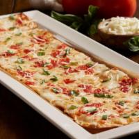 Margherita Fresca Flatbread · Fresh mozzarella | zesty pizza sauce | fresh basil | parmesan cheese