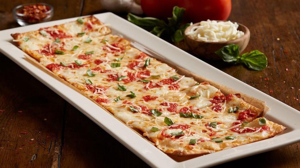 Margherita Fresca Flatbread · Fresh mozzarella | zesty pizza sauce | fresh basil | parmesan cheese