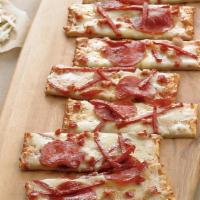 Pepperoni Extreme Flatbread · Pepperoni sliced, diced + julienned | BJ’s signature five cheese blend | zesty pizza sauce