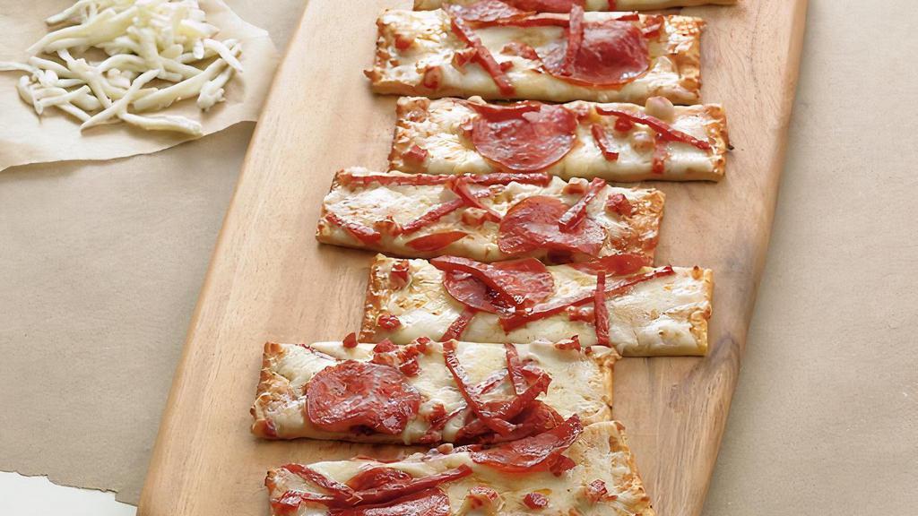 Pepperoni Extreme Flatbread · Pepperoni sliced, diced + julienned | BJ’s signature five cheese blend | zesty pizza sauce